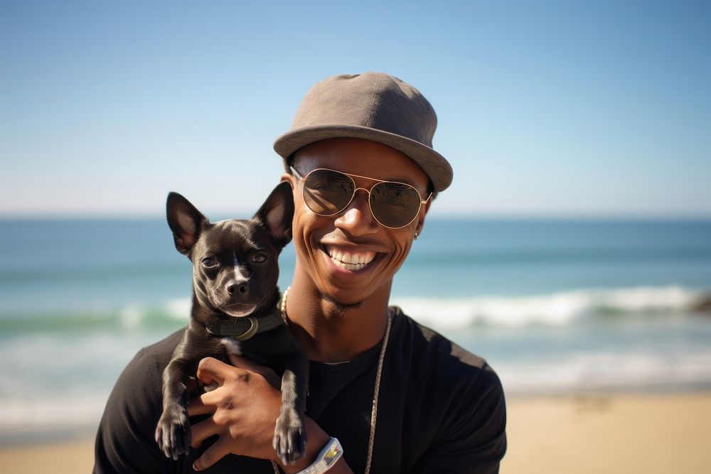 Man holding their dog beach sunglasses chihuahua.