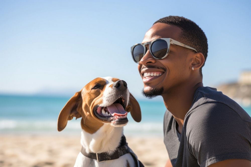 Man holding their dog beagle beach sunglasses.
