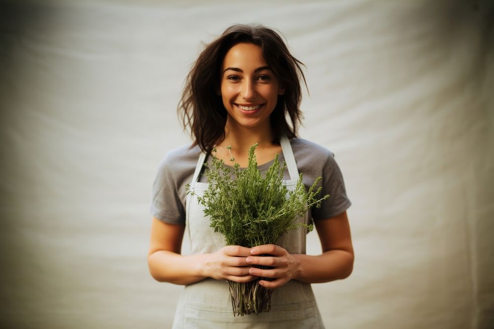 Woman holding Thyme herbs smile portrait flower.
