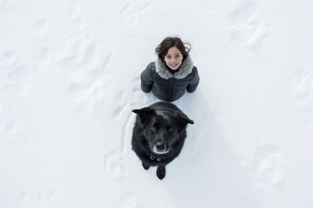 Kid with dog winter snow portrait.
