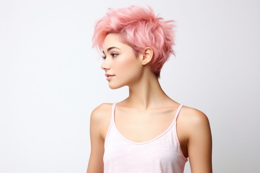 Woman in white t-shirt adult pink hair.