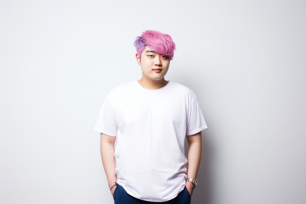 Man in white t-shirt adult pink hair.