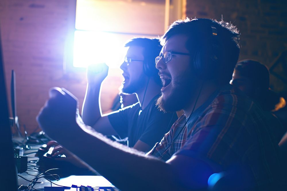 Team winning a match at a gaming tournament glasses adult entertainment.