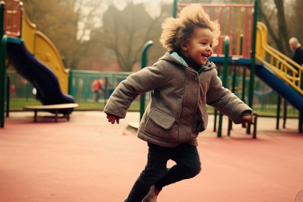 Kid running at playground outdoors child park.