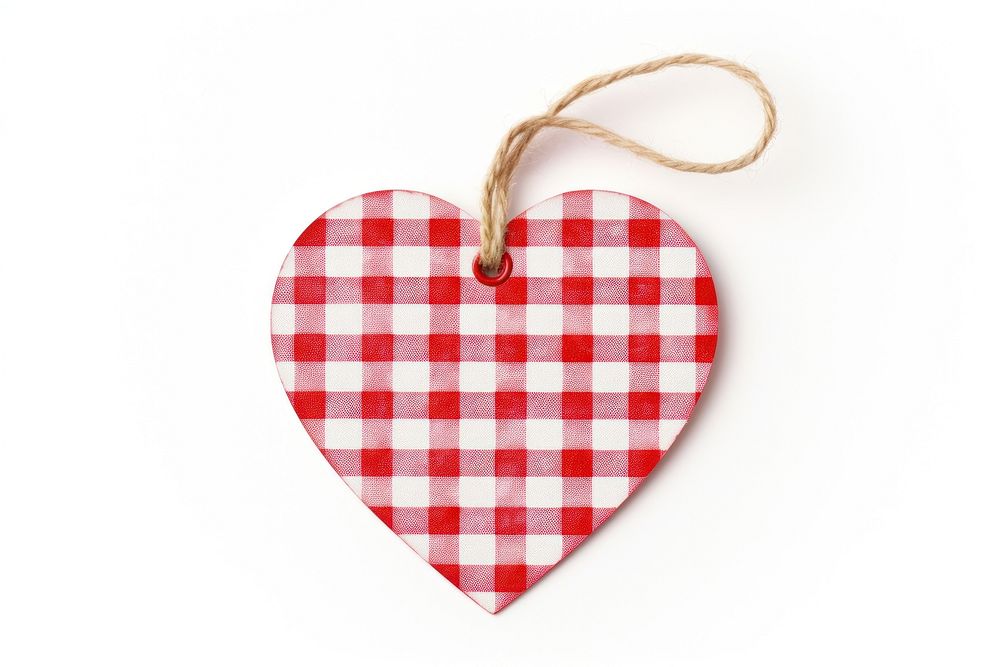 Checked pattern heart shaped paper gift tag white background celebration accessories.
