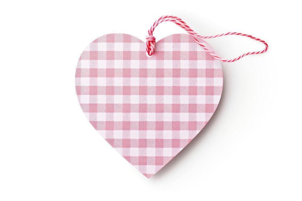 Pink checked pattern heart shaped paper gift tag white background celebration decoration.