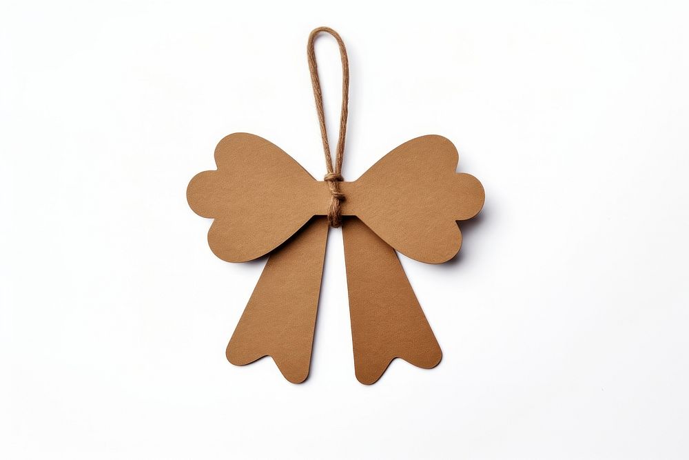 Bow shaped brown paper gift tag gingerbread ribbon cookie.