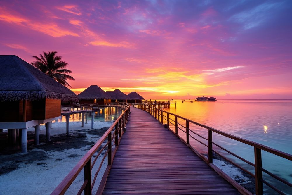 Sunset maldives scenery architecture building outdoors.