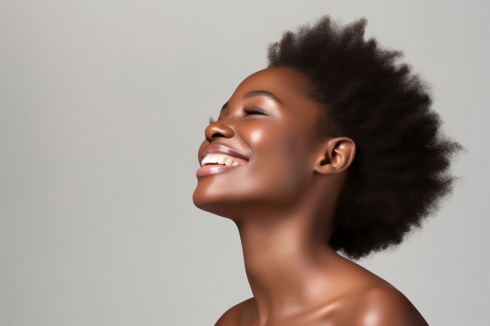 Black woman portrait laughing smiling.
