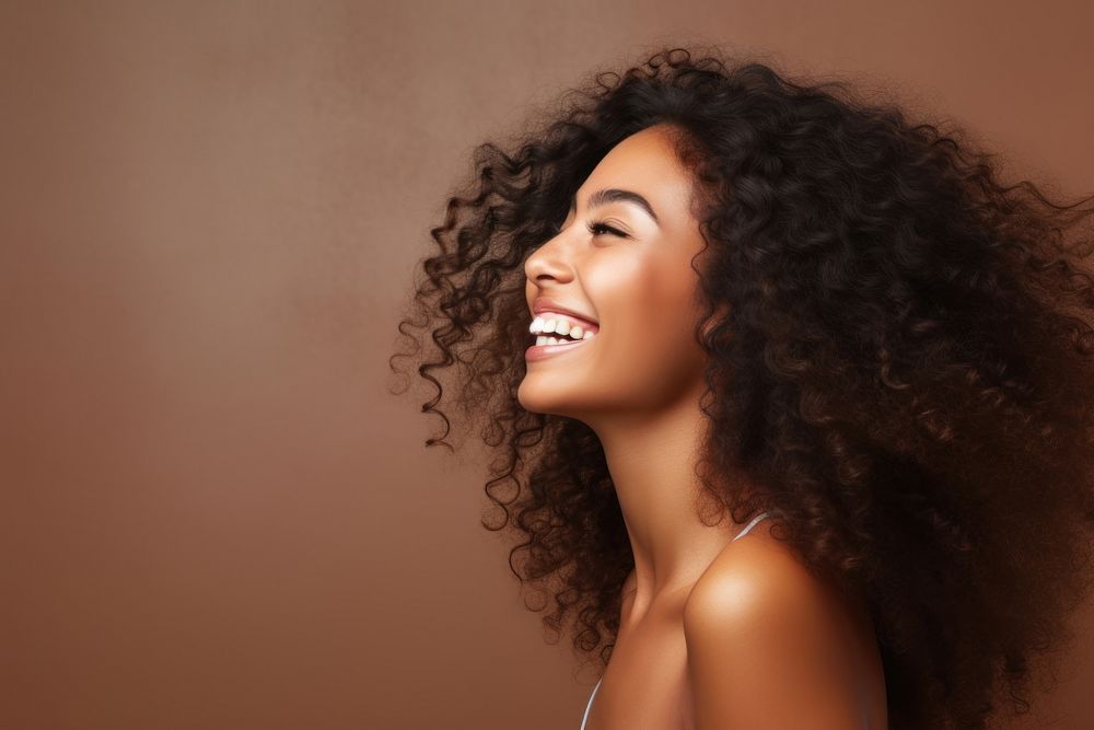 Black woman laughing portrait smiling.