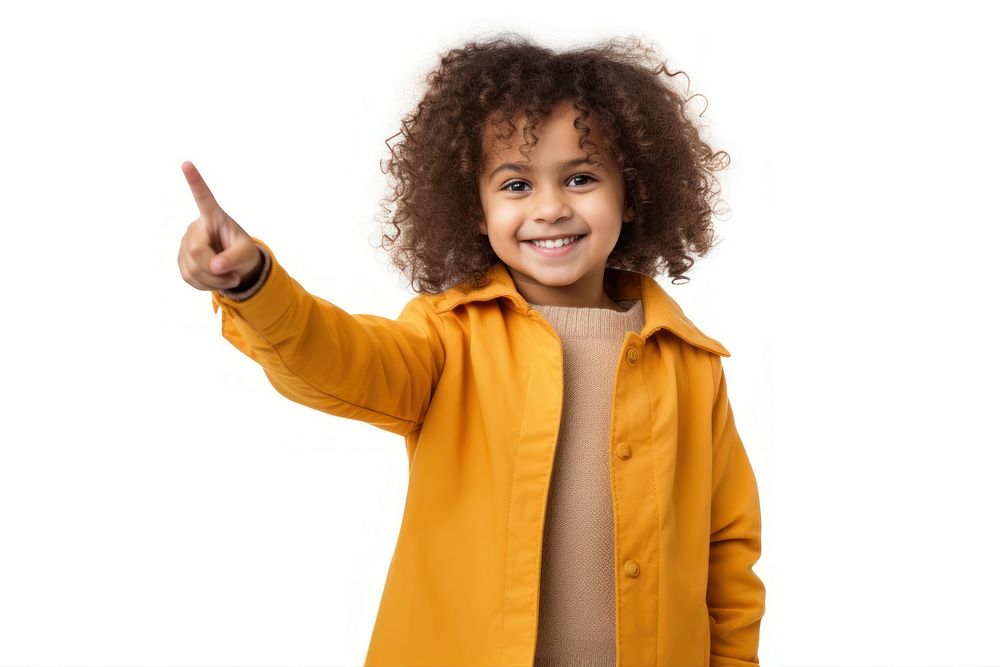 A latina brazilian little girl pointing her finger to the side opposite to her cheerful portrait smiling. AI generated Image…