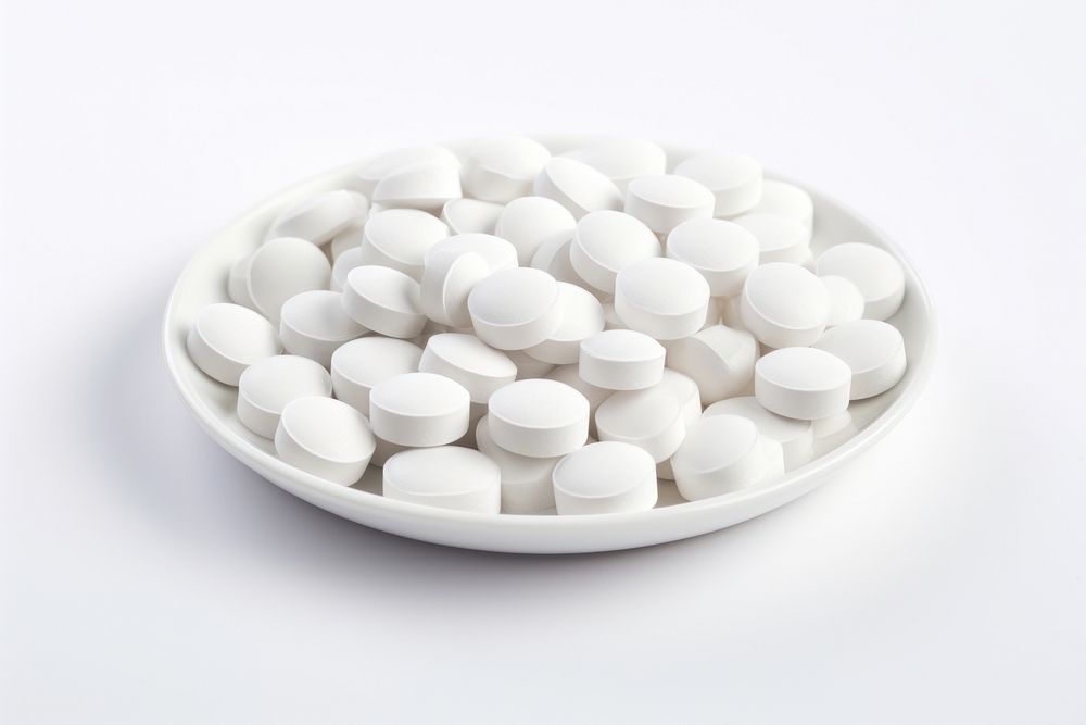White round pills white background medication freshness. AI generated Image by rawpixel.