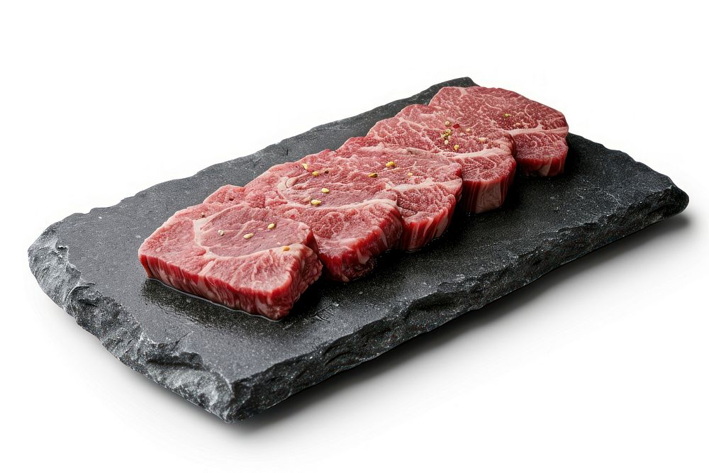 Premium Rare Slices sirloin Wagyu A5 beef on stone plate steak slice meat.