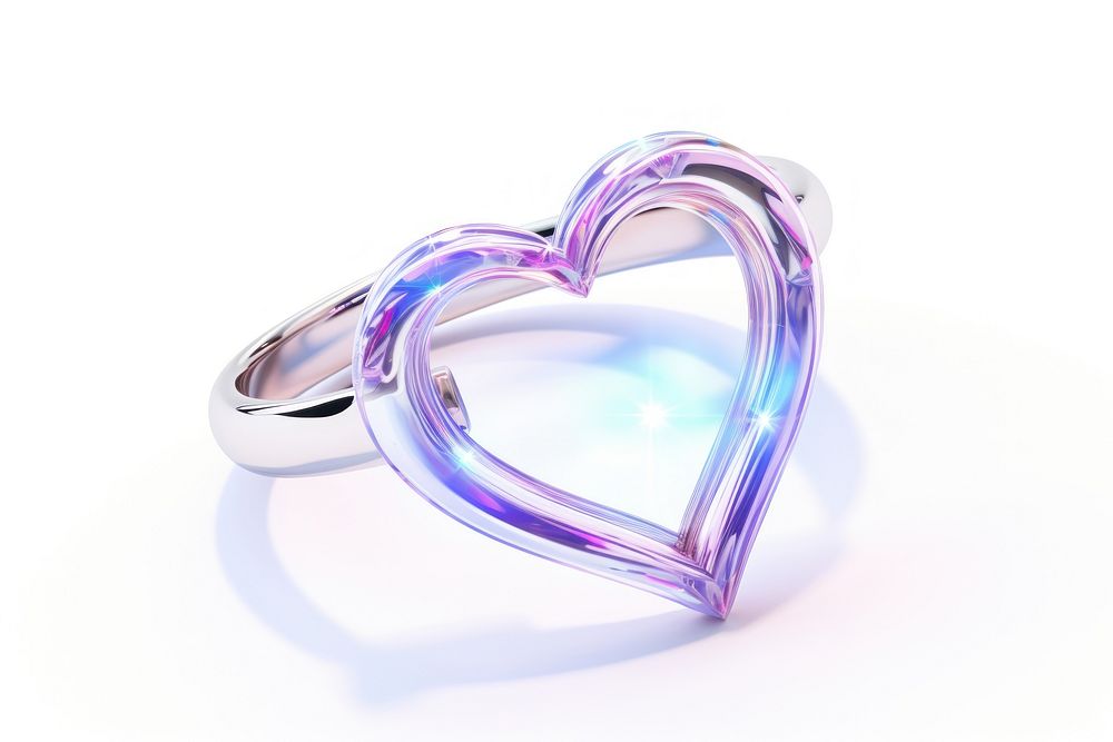 Heart shape have a ring cross around jewelry white background accessories. AI generated Image by rawpixel.