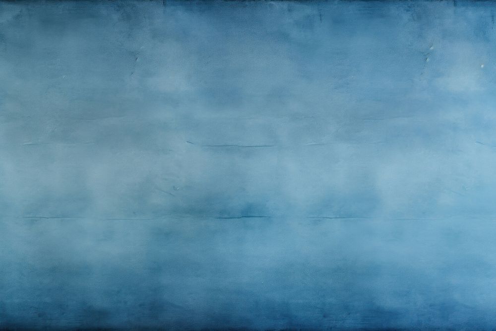 Old faded Indigo blue gradient paper backgrounds texture canvas.