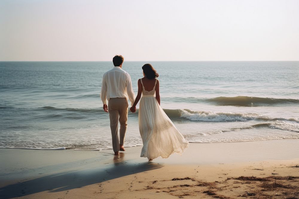 Wedding couple on the beach outdoors nature motion. AI generated Image by rawpixel.