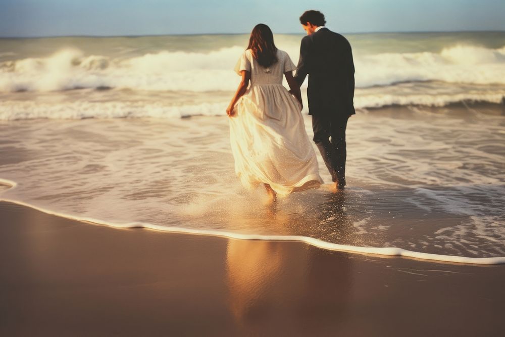 Wedding couple on the beach photography outdoors fashion. AI generated Image by rawpixel.