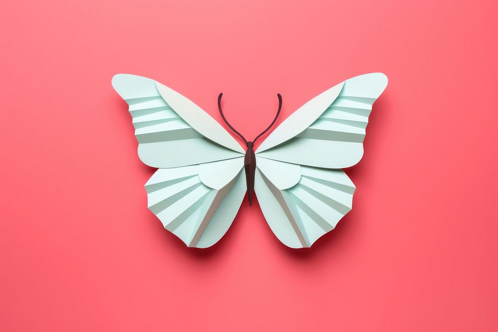 Paper cutout of a butterfly animal art appliance.