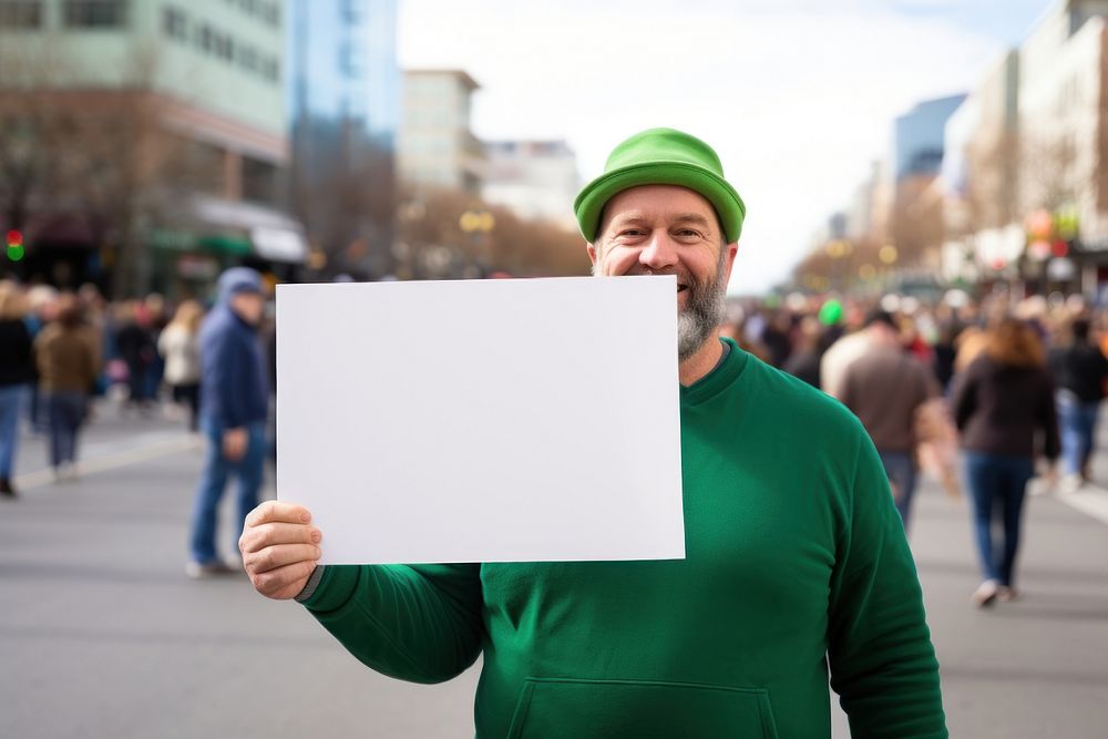 Middle-aged man holding a blank poster sign portrait street adult.