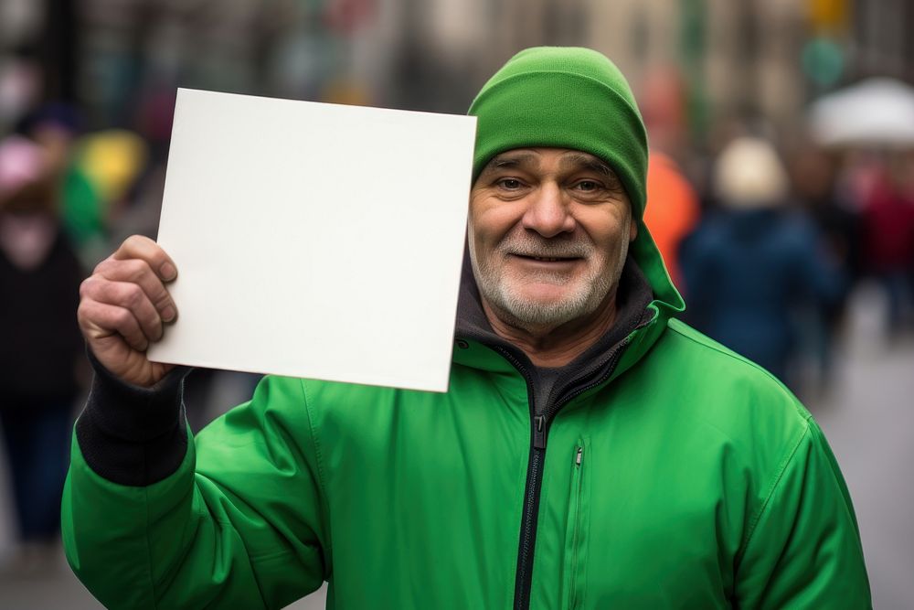 Middle-aged man holding a blank poster sign portrait adult photo.