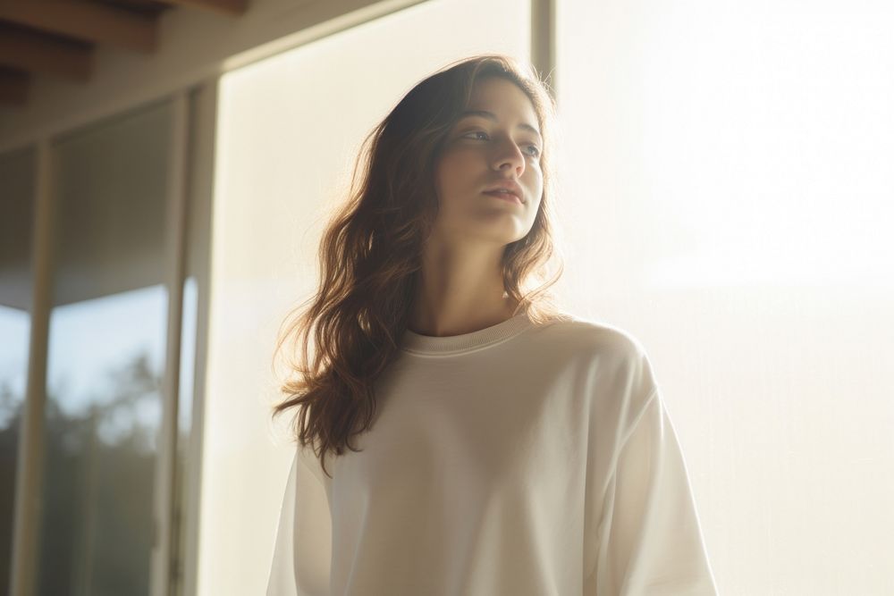 Women wear a white sweater with happy face portrait adult contemplation.