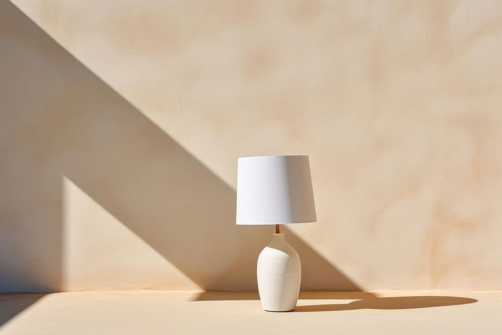 A white lamp shadow wall decoration.