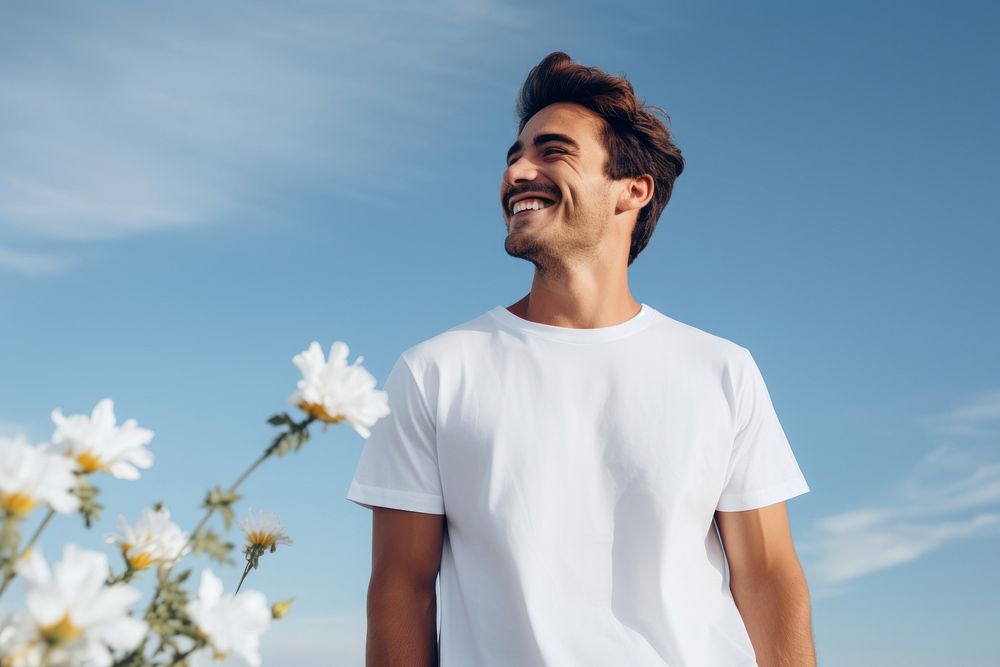 Happy man wearing white t-shirt laughing flower summer.