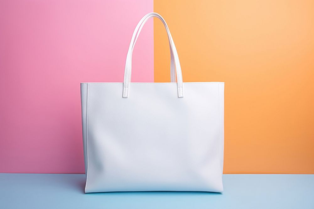 A white tote Bag bag handbag accessories.