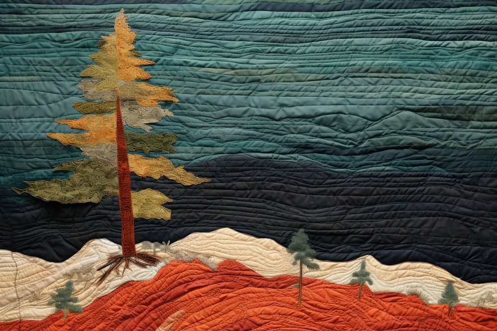 Minimal colorful pine tree textile craft quilt.