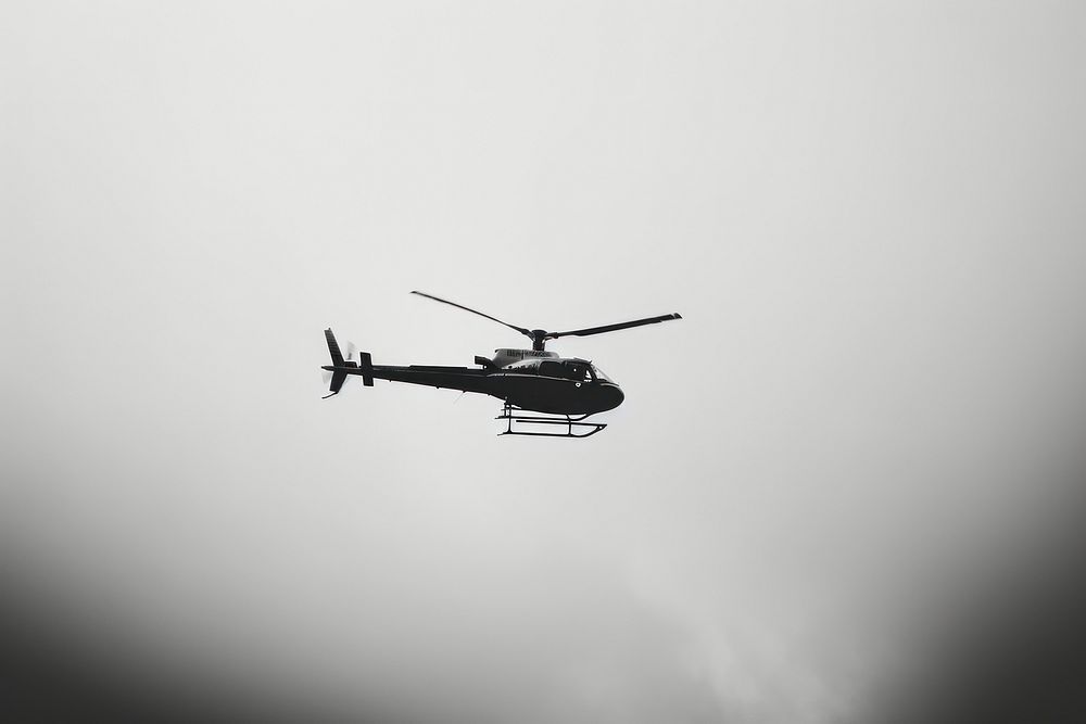 Helicopter on the sky helicopter monochrome aircraft.