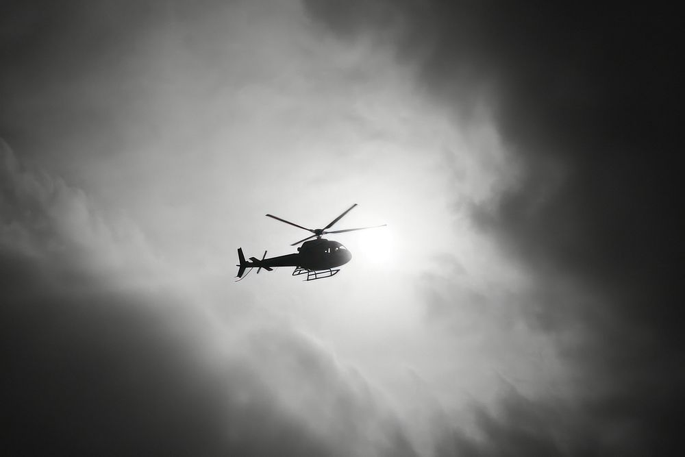 Helicopter on the sky helicopter monochrome aircraft.