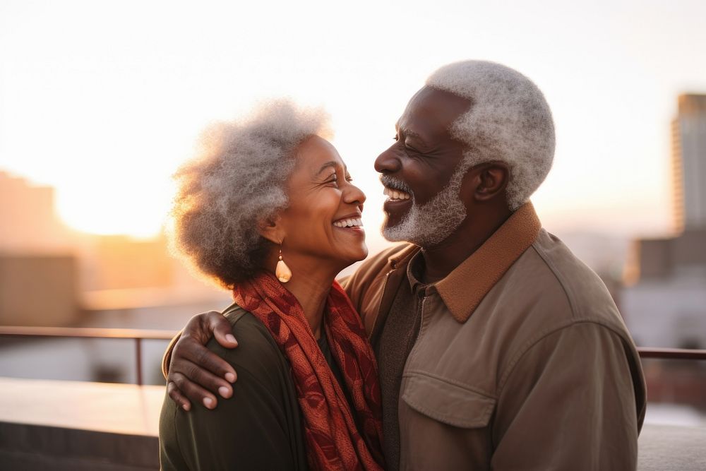 Black senior people couple having romantic moment embracing adult happy. AI generated Image by rawpixel.