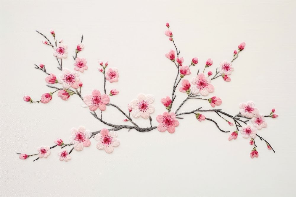 Embroidery style cherry blossom white fabric flower.