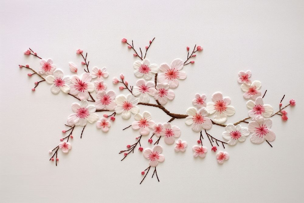 Embroidery style cherry blossom white fabric flower.
