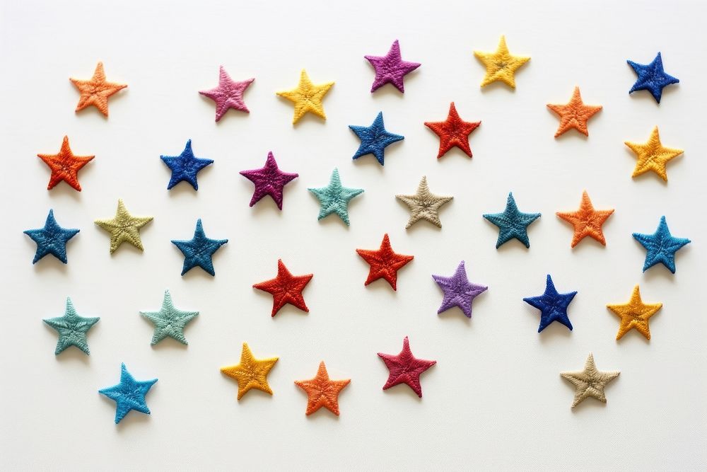 White fabric embroidery colorful stars.