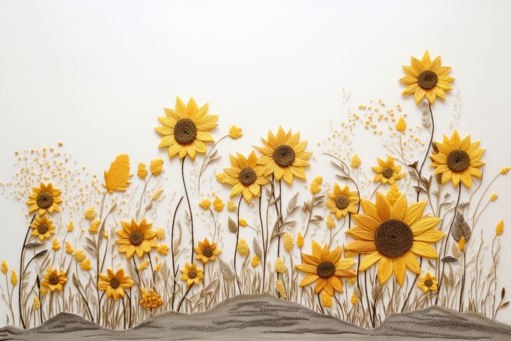 Field of sunflower embroidery style white fabric mountain.