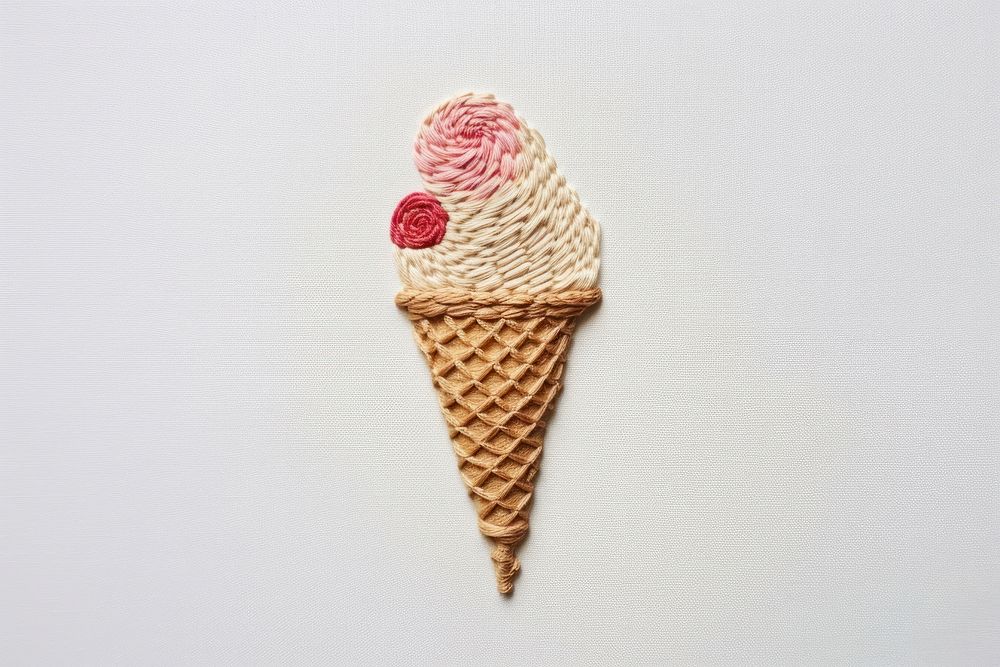 White fabric embroidery ice cream dessert.