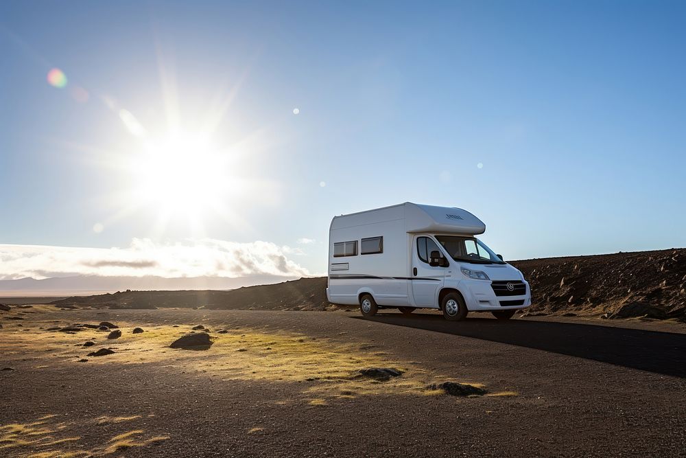 Sun Scene of Moss cover on volcanic landscape with motor home camping van car of Iceland vehicle sun transportation.