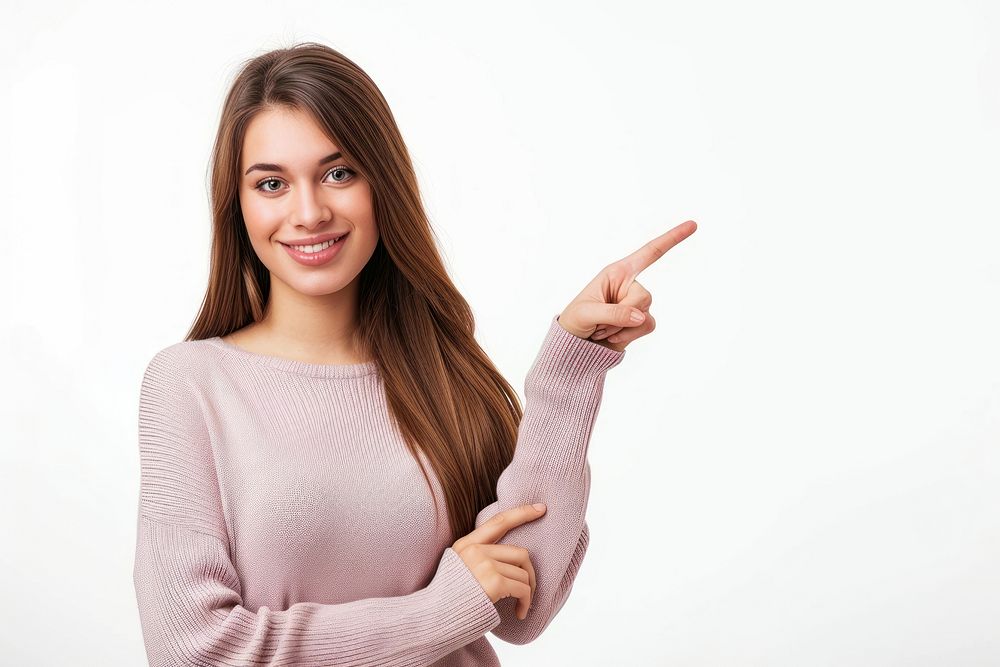 Woman over pointing to the side sweater finger smile.