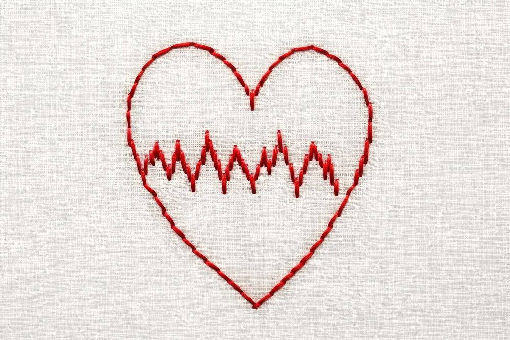 A heart with heart beat EKG graph embroidery pattern backgrounds. AI generated Image by rawpixel.