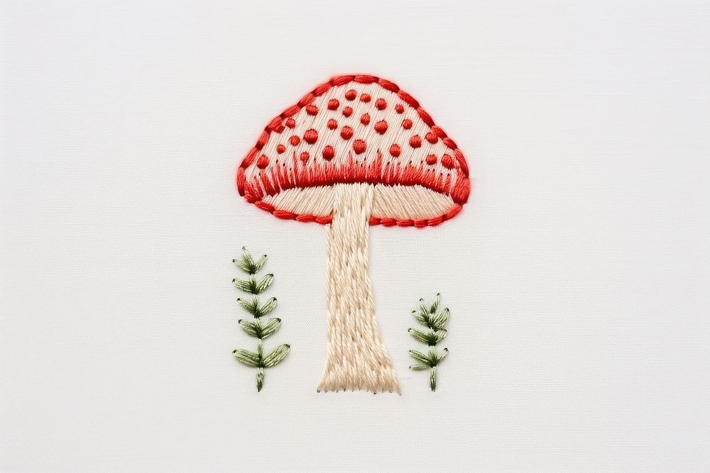 Mushroom embroidery needlework textile.
