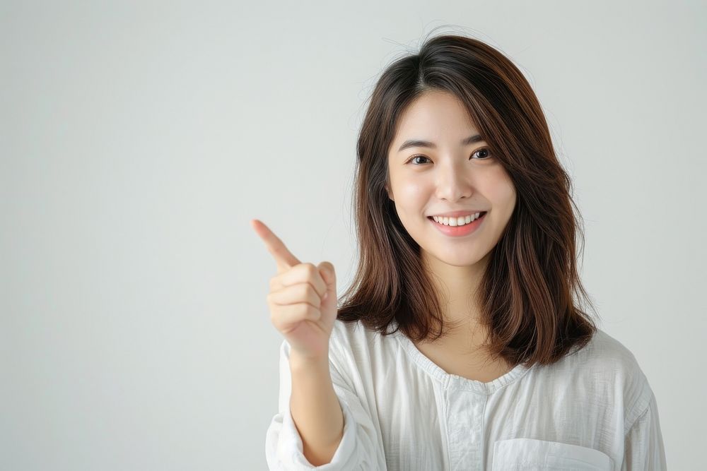 Woman happiness standing finger pointing adult smile hand.