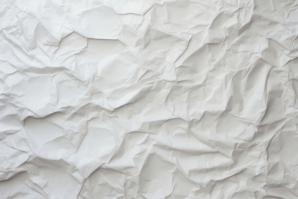 Recycled crumpled paper texture backgrounds white textured. AI generated Image by rawpixel.