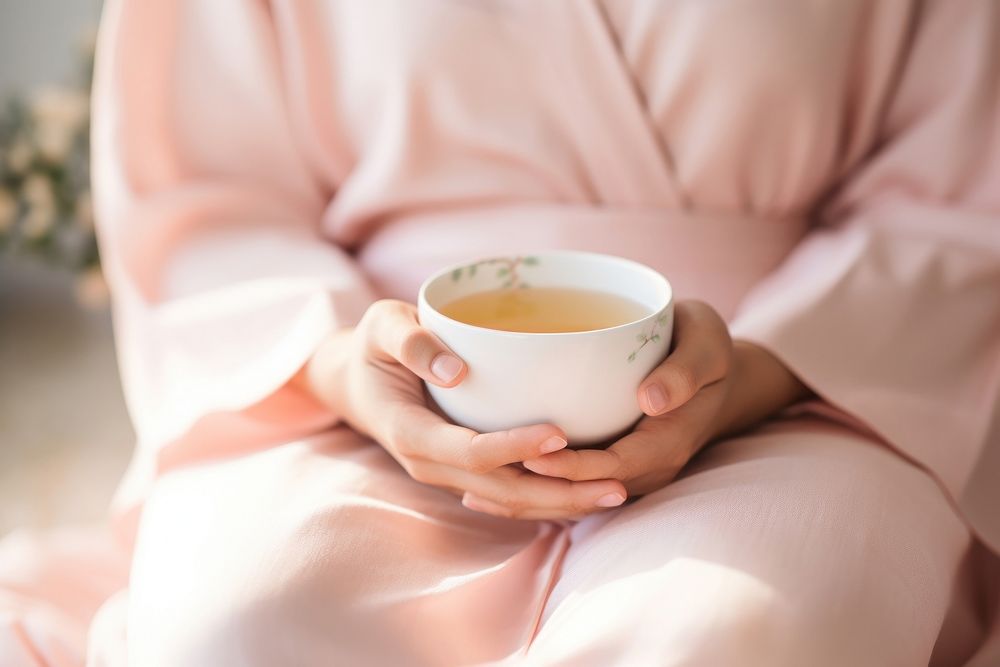 Hands holding japanese tea cup drink mug refreshment. AI generated Image by rawpixel.