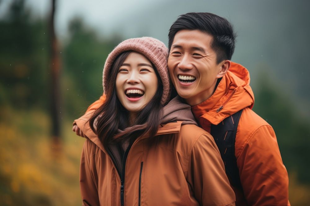 Happy asia couple laughing happiness outdoors. AI generated Image by rawpixel.