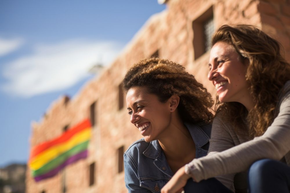 Lesbian woman couple laughing sunlight smiling. AI generated Image by rawpixel.