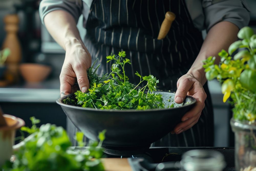 Pulling herbs plant cooking agriculture. Premium Photo rawpixel