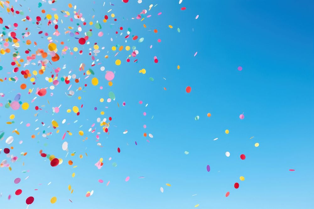 Colorful confetti on clear blue sky background backgrounds balloon celebration. AI generated Image by rawpixel.