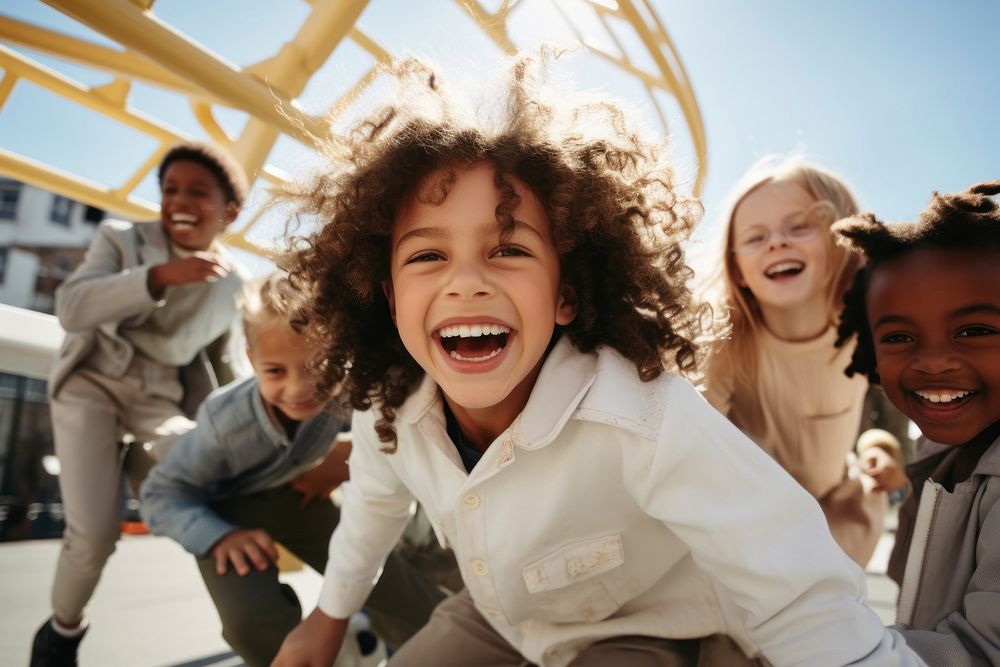 Inclusivity kids playing together in the playground laughing adult togetherness. AI generated Image by rawpixel.