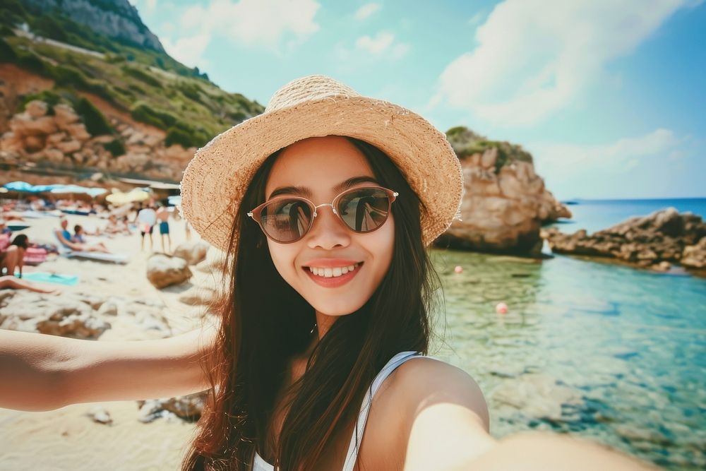 Tuscany beach in italy selfie sunglasses portrait.